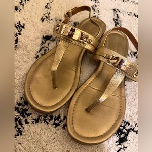 Gold Coach almost new sandals.